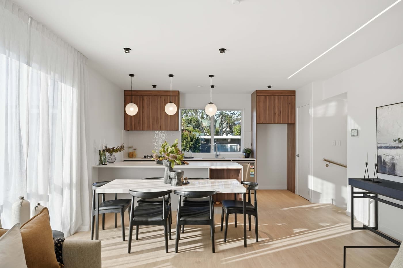 Dining room under pendant lights